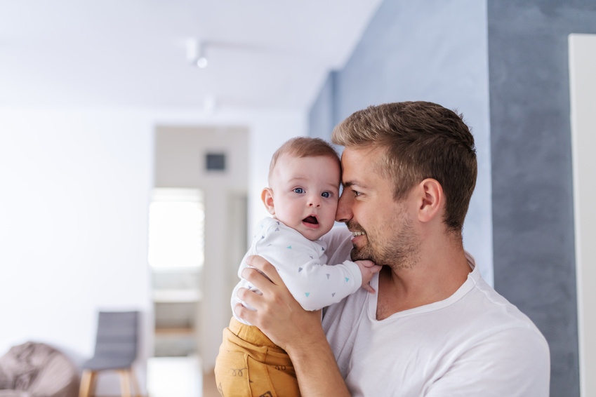 A father holding his baby